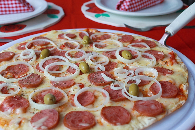 Um charme de cantina italiana! Qualquer pizza grande de até R$38,90 por R$19,90 no Villa Caravela